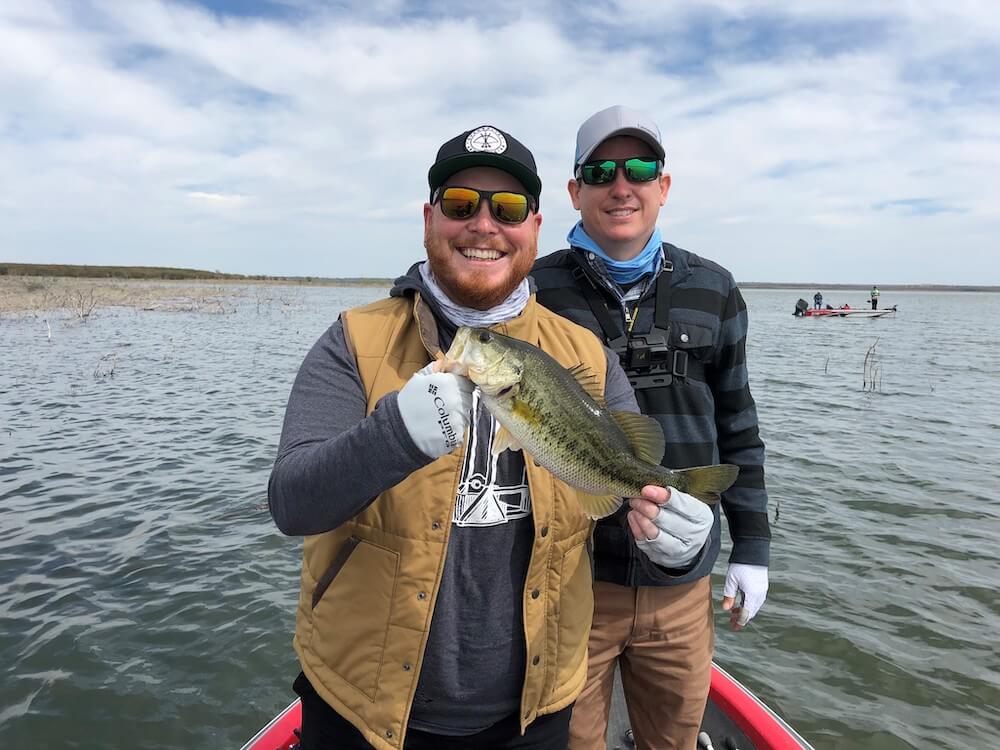 Two men and fish they caught