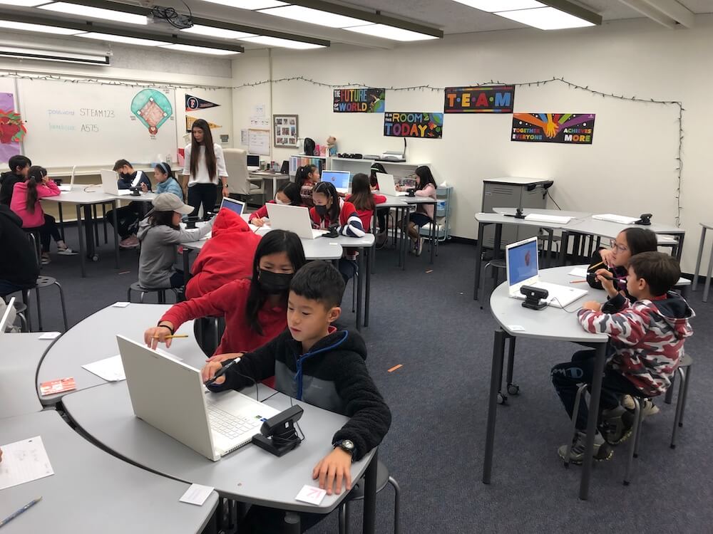 Irvine International Students in the classroom with computers