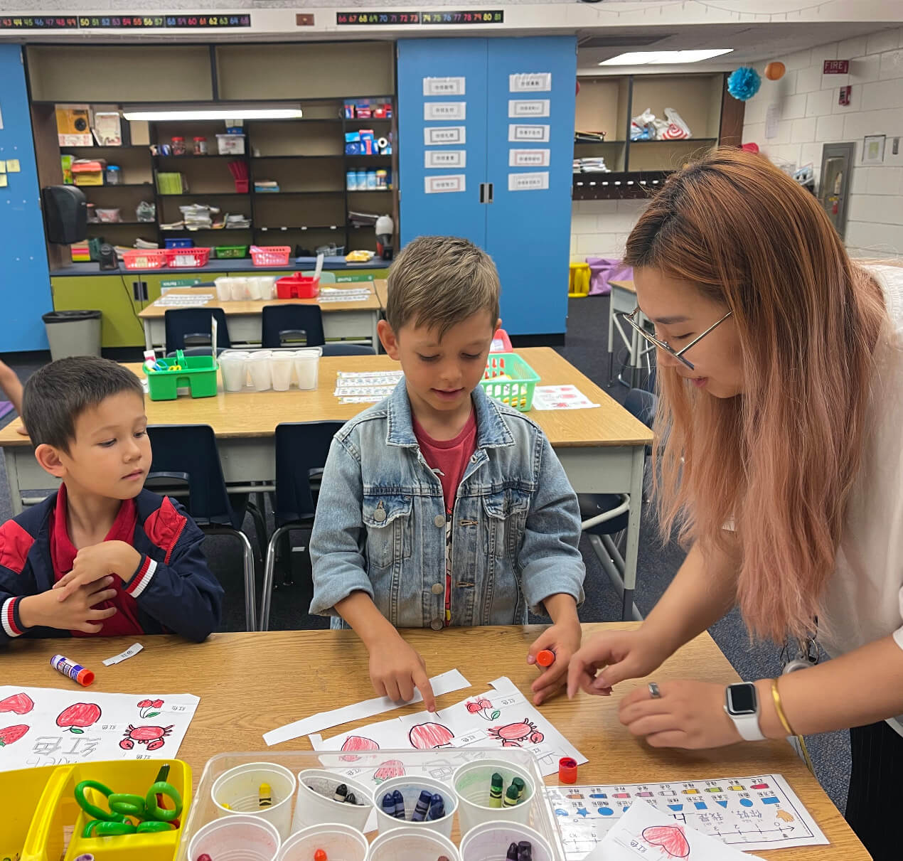 students with teacher in class